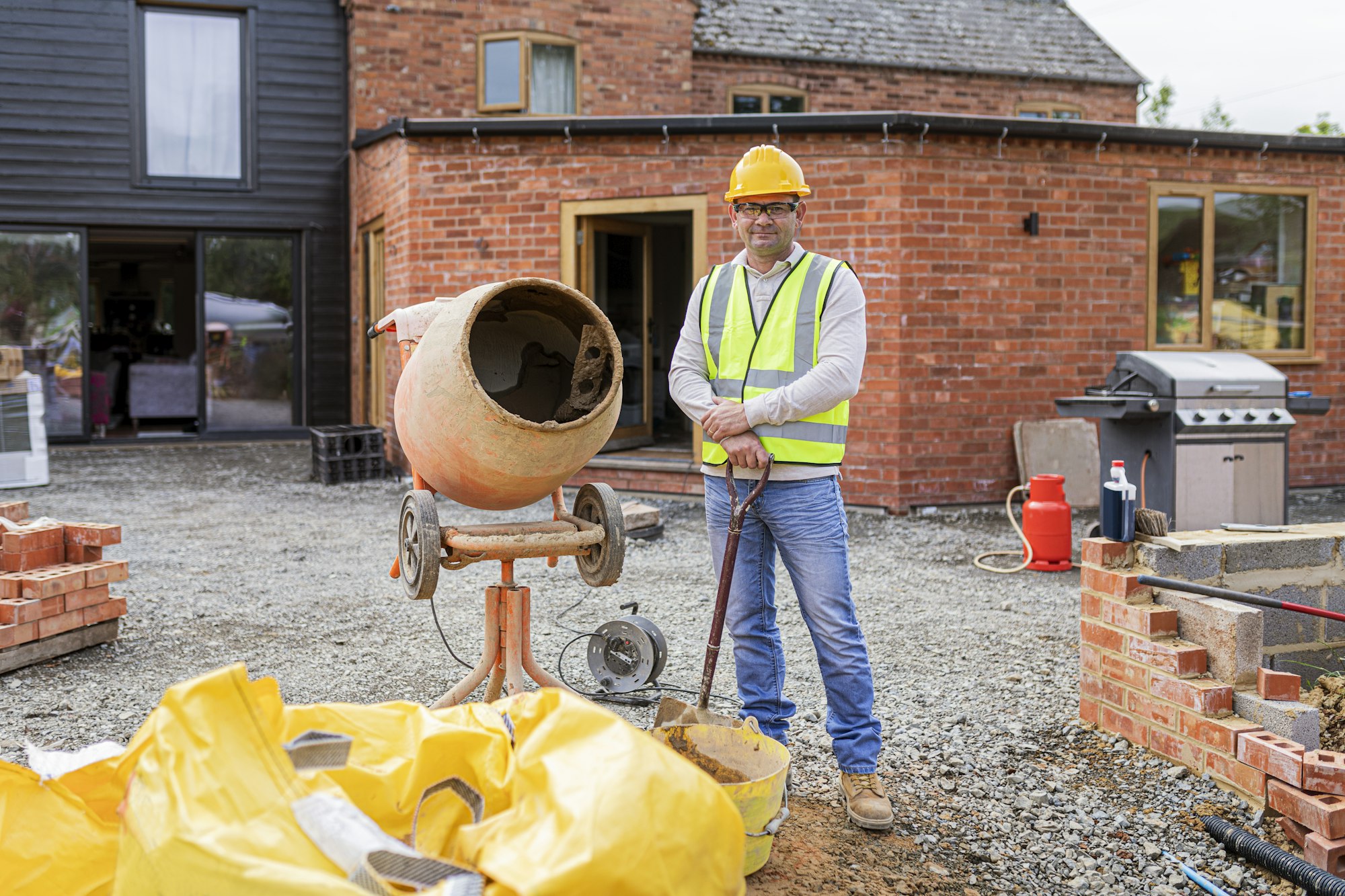 Contractor remodeling the home exterior