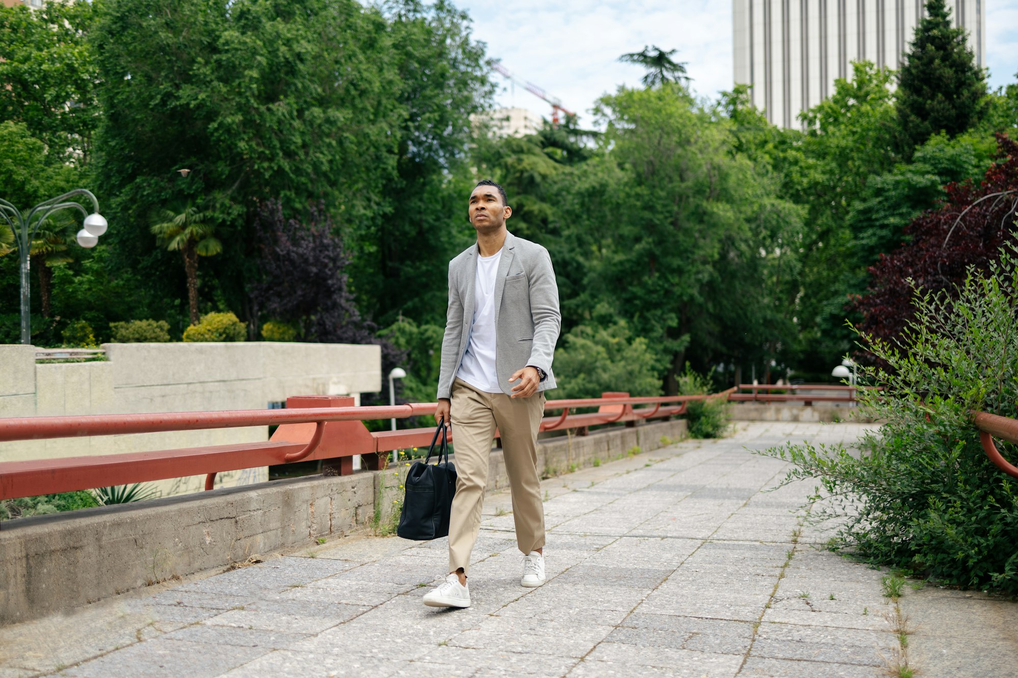 Man walking through financial area with briefcase