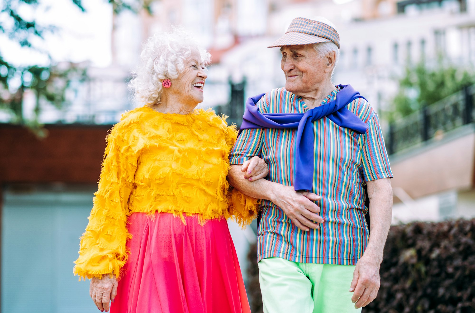 old modern couple dressing fashionable colored clothes